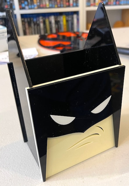 Batman Desk Organiser Laser Cutting Project - Enhance your child's desk with this Batman-themed stationery holder, expertly crafted from durable acrylic. Perfect for organising pens, pencils, and other small items, it adds a fun and functional item superhero touch to any workspace. The iconic Batman design inspires creativity and brings a sense of adventure to everyday tasks.