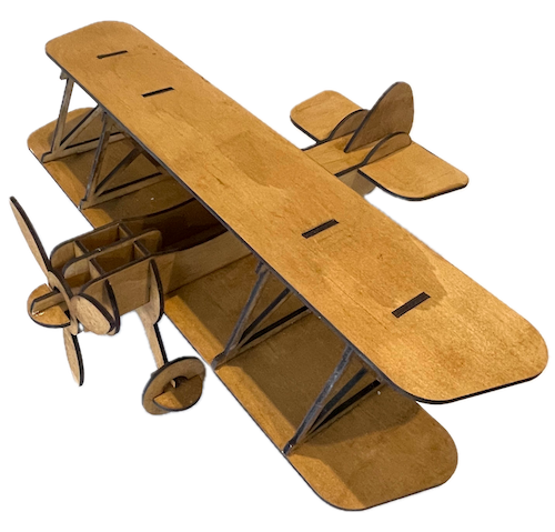 Vintage Bi-plane Soars Laser Cutting Project - Take a step back in time with this delightful wooden bi-plane model. This classic design brings the charm of early aviation to your home, making it an excellent project for a gift to a child. Download the design files, follow the easy-to-understand instructions, and in no time, you’ll have a stunning piece ready to display or gift to a loved one.