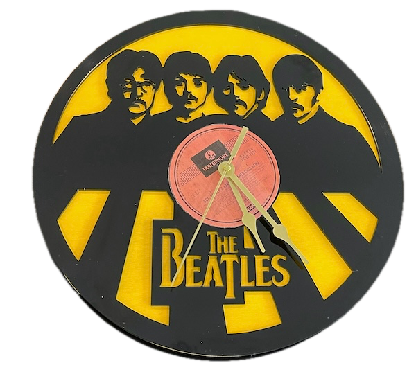 Timeless Fab Four Laser Cutting Project - This unique clock features an iconic silhouette of The Beatles, laser cut from acrylic, with the band's name prominently displayed underneath. Perfect for any music enthusiast or Beatles fan, this clock is a functional timepiece and a striking piece of art. Its design captures the essence of classic rock with a modern twist.