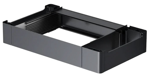 This image shows a black, rectangular riser base designed for use with laser cutting and engraving machines. The sturdy frame structure has a hollow center, allowing it to elevate the machine, making it possible to work on thicker materials or accommodate attachments like rotary tools. This riser base increases the laser’s flexibility and expands the range of projects it can handle by creating additional working height for larger objects or specialized tools.