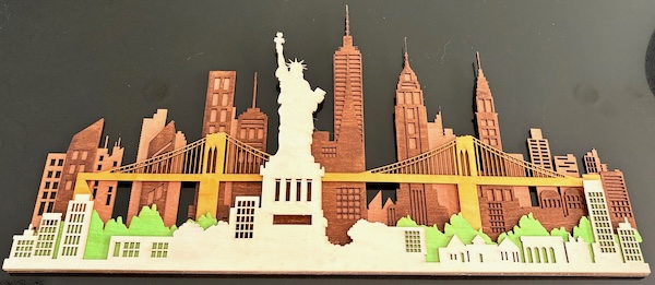 The Big Apple in Layers Laser Cutting Project - Capture the energy of New York City with this stunning laser-cut skyline piece featuring the Statue of Liberty, iconic skyscrapers, and the city’s famous bridges. Made with multiple layers of carefully cut material, this project brings depth and character for NYC lovers or as a unique gift. Click the link to get started and add a piece of the Big Apple to your collection!